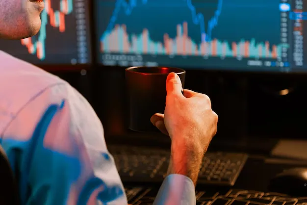 Man drinking coffee in front of two monitors, watching live trading charts (source: https://www.freepik.com/premium-photo/cropped-working-business-trader-holding-coffee-cup-focusing-stock-gusher_340237100.htm#fromView=keyword&page=1&position=9&uuid=aec82ddb-da24-40f6-8171-e5cbcd094f1a&query=Prop+trading)