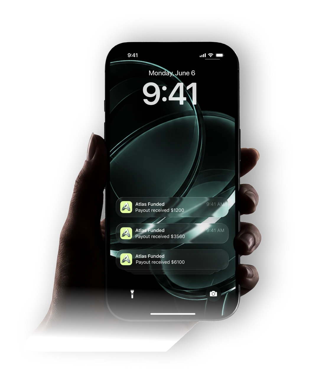 A phone showing three Atlas Funded payout notifications